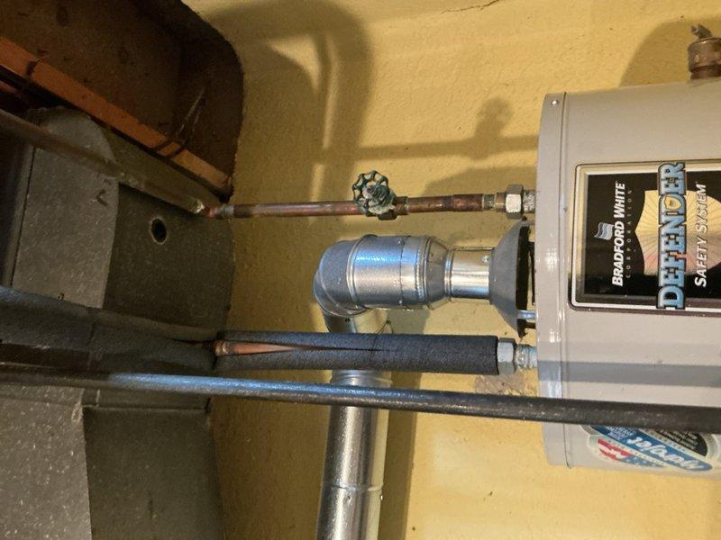 Completed comprehensive Gold AC inspection on 10+ year old residential split system with basement air handler and exterior condenser unit. Performed multi-point inspection including examination of indoor evaporator coil, refrigerant lines, condensate drainage system, electrical connections, and outdoor condensing unit. Verified proper system operation, checked refrigerant pressures, inspected condenser fins and fan assembly, confirmed adequate airflow, and assessed overall equipment condition. All components found operational with no immediate service needs identified at time of inspection.