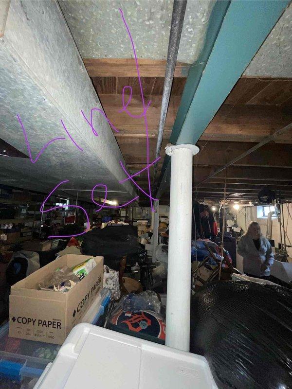 Conducted comprehensive site assessment for complete HVAC system replacement in basement utility area of small residential property (0-1500 sq ft). Evaluated existing heating and cooling equipment configuration, including natural gas furnace and air conditioning components, documented current ductwork layout and support structures, assessed utility connections and clearance requirements for new equipment installation. Photographed existing conditions including equipment location, utility sink proximity, ceiling-mounted components, ductwork pathways, and available workspace to develop replacement specifications and installation plan for new heating and cooling system.