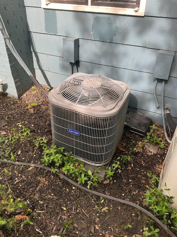 Completed comprehensive Gold AC inspection on multi-unit residential system consisting of three outdoor condenser units. Performed thorough visual assessment of equipment condition, verified proper installation of refrigerant lines and electrical connections, and documented equipment status with detailed photographs. Units showed fair operational condition with minor vegetation growth around bases requiring ongoing maintenance attention; homeowner advised of weather-dependent inspection parameters for optimal system evaluation.