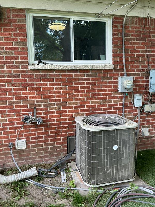 Conducted on-site evaluation for new whole home generator installation at residential property. Assessed existing electrical service panel and meter location on exterior brick wall, evaluated available yard space for generator placement considering proximity to existing HVAC condenser unit and utility connections, and documented site conditions including access points and electrical infrastructure to develop comprehensive installation estimate.