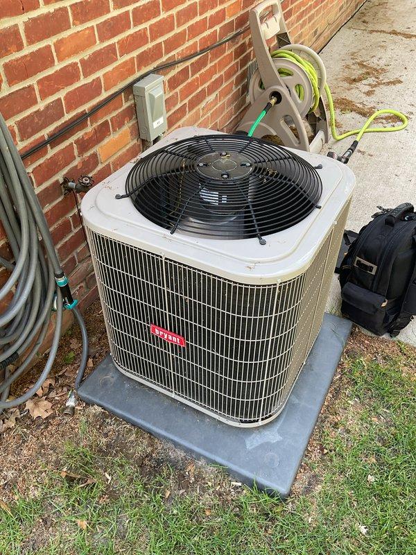 Completed comprehensive Gold AC Inspection and tune-up on a six-year-old outdoor condensing unit located at the rear of the property. Performed full system evaluation including refrigerant charge verification, electrical component testing, and airflow measurements. Inspected and cleaned condenser coils, checked capacitor values, and verified proper compressor operation. Tested and confirmed proper operation of Aprilaire humidity control system with settings appropriately configured for seasonal conditions. All components operating within manufacturer specifications with no deficiencies noted at time of service.