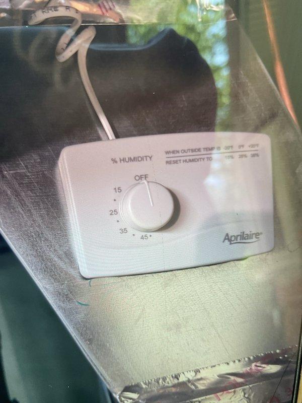Completed comprehensive Gold AC Inspection and tune-up on a six-year-old outdoor condensing unit located at the rear of the property. Performed full system evaluation including refrigerant charge verification, electrical component testing, and airflow measurements. Inspected and cleaned condenser coils, checked capacitor values, and verified proper compressor operation. Tested and confirmed proper operation of Aprilaire humidity control system with settings appropriately configured for seasonal conditions. All components operating within manufacturer specifications with no deficiencies noted at time of service.
