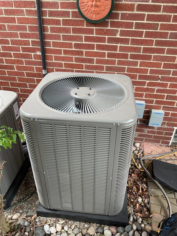 Completed comprehensive AC inspection on less than one-year-old unit located in basement. Performed thorough examination of outdoor condenser unit, General brand humidistat control system with temperature-humidity correlation settings, thermostat operation, and hot water tank. All components inspected and found to be functioning within normal parameters, with system properly maintained and operational.