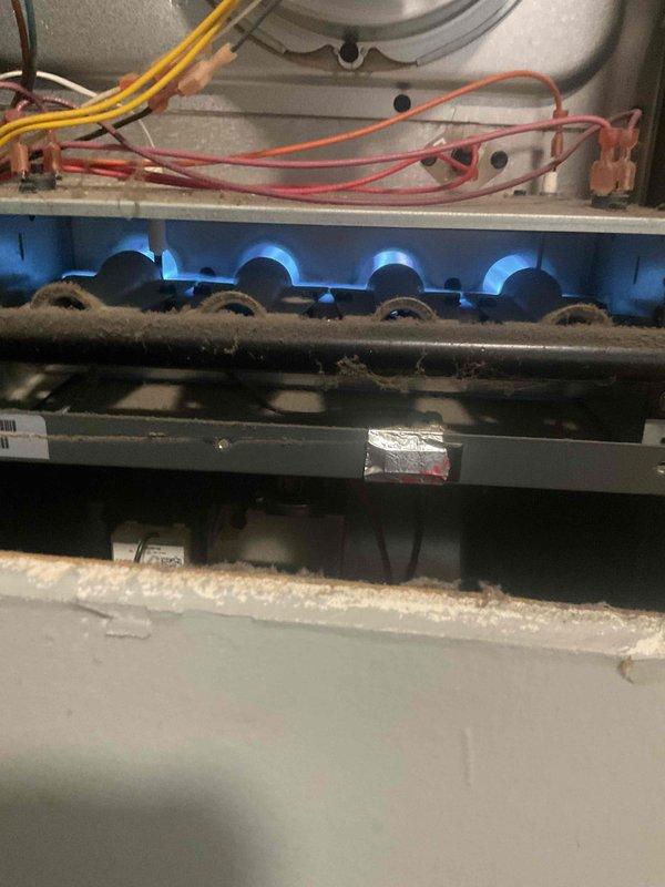 Completed routine tune-up maintenance on a 5-year-old furnace located on the main level. Performed comprehensive inspection of all system components including gas valve, burner assembly, blower motor, and electrical connections. Verified proper ignition sequence and observed blue flame pattern across all burners, confirming optimal combustion. Inspected heat exchanger, flue pipe, and venting system for proper operation. Checked and tested all safety controls and electrical wiring connections. System operating within manufacturer specifications with no issues found.