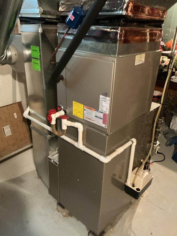 # HVAC Maintenance Summary

Completed comprehensive Gold-level spring maintenance inspection on a 2013 residential air conditioning system with evaporator coil located in basement utility room. Performed full system evaluation including inspection of furnace cabinet, refrigerant lines, condensate drainage system, and associated mechanical components. All equipment connections, piping, and auxiliary devices were examined and documented photographically. System operational parameters verified and unit prepared for cooling season operation.