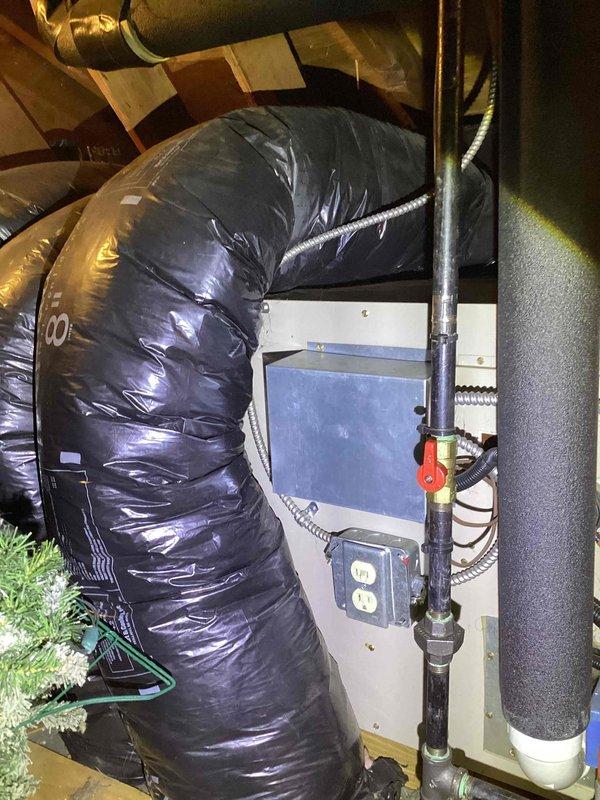 Inspected existing whole-house dehumidifier installed in attic and identified improper installation issues. Unit was incorrectly mounted with inadequate clearance and improper ductwork connections, compromising system efficiency and serviceability. Documented current installation conditions with photographs showing equipment placement, electrical connections, and duct configuration. Prepared comprehensive estimate for complete dehumidifier replacement with proper installation specifications including correct mounting location, appropriate electrical service, condensate drainage, and integration with existing HVAC ductwork system.
