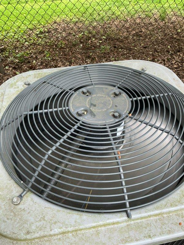 Performed comprehensive cooling maintenance on a 20-year-old Arcoaire system. Cleaned and inspected outdoor condenser unit, verified proper fan operation and guard integrity, and conducted full system startup and performance check. Confirmed REMEHALO WiFi air purification device operational on indoor air handler, verified all mechanical components functioning within normal parameters, and system operating properly upon completion.