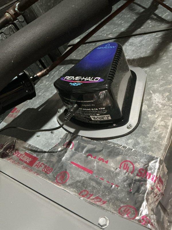 Performed comprehensive cooling maintenance on a 20-year-old Arcoaire system. Cleaned and inspected outdoor condenser unit, verified proper fan operation and guard integrity, and conducted full system startup and performance check. Confirmed REMEHALO WiFi air purification device operational on indoor air handler, verified all mechanical components functioning within normal parameters, and system operating properly upon completion.