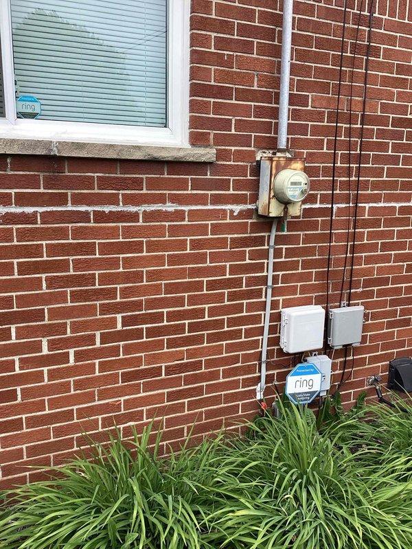 Responded to customer complaint of loud noises from 12-year-old air conditioning system located in basement. Upon inspection, diagnosed system as low on R410A refrigerant and identified oil traces in condensate trap indicating probable evaporator coil leak. Provided replacement estimate for aging AC unit due to refrigerant leak and system age exceeding typical service life.