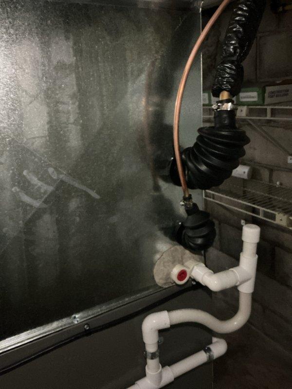 Performed system start-up on newly installed air conditioning equipment with basement-mounted evaporator coil. Verified proper operation of all components including air handler, refrigerant lines, and condensate drainage system with pump. Inspected installation quality, confirmed secure mounting of access panels, checked refrigerant line connections, and tested condensate pump functionality to ensure system is operating within manufacturer specifications.
