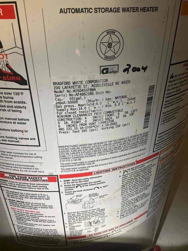 Completed comprehensive heating tune-up on two residential furnaces located in basement, both units less than 10 years old and operational at time of service. Performed combustion analysis testing using digital analyzer, measuring oxygen levels at 10.8%, carbon monoxide at 13 PPM, pressure at 0.04, and flue temperature at 31.4°F. Inspected Bradford White 50-gallon natural gas water heater (Model MI5045GFBM4) and verified proper operation, confirmed all manufacturer labels and safety warnings intact and legible. All equipment found in good working condition with no immediate repairs required.
