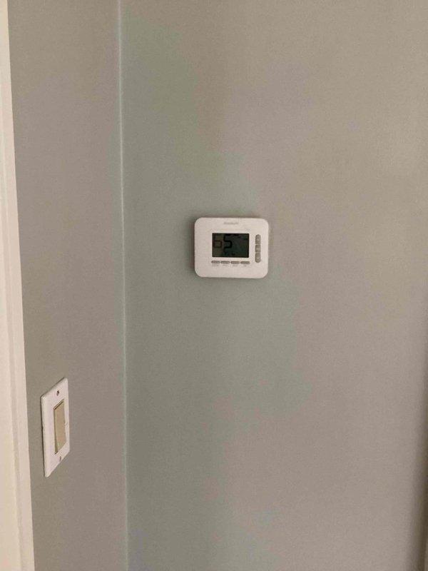 Performed estimate on hot water boiler located in basement with gas leak requiring temporary repair by utility company. Unit is over 10 years old and identified as obsolete with failing components and no replacement parts available for repair. Documented existing system including thermostat operation and plumbing configuration with PVC drainage lines and insulated supply piping. Provided replacement recommendations due to age of equipment, safety concerns from gas leak, and unavailability of serviceable parts for continued operation.