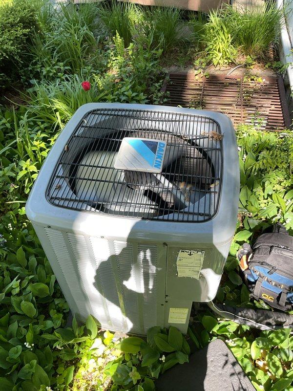 Completed comprehensive Gold AC inspection on a 6-year-old residential air conditioning system with air handler located in attic. Performed thorough evaluation of outdoor condenser unit positioned on concrete pad, verifying proper operation of compressor, fan assembly, and refrigerant levels. Inspected attic-mounted air handler and confirmed airflow through pleated air filter measuring 14x06x1, noting filter media showing signs of use and discoloration. Verified system operational status with homeowner present, conducted visual inspection of all accessible components including electrical connections, condensate drainage, and ductwork. System found to be functioning properly under suitable weather conditions for accurate testing. Documented equipment condition with photographic evidence of both outdoor condenser unit and indoor filter assembly for maintenance records.