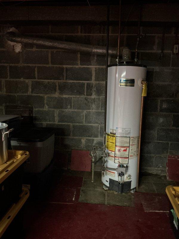 Provided estimate for tankless water heater replacement to replace existing 15-year-old conventional tank-style water heater located in basement. Current unit is operational but customer is interested in upgrading to tankless technology for improved efficiency and on-demand hot water delivery.