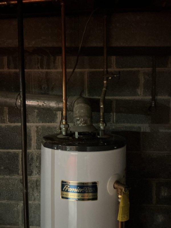 Provided estimate for tankless water heater replacement to replace existing 15-year-old conventional tank-style water heater located in basement. Current unit is operational but customer is interested in upgrading to tankless technology for improved efficiency and on-demand hot water delivery.