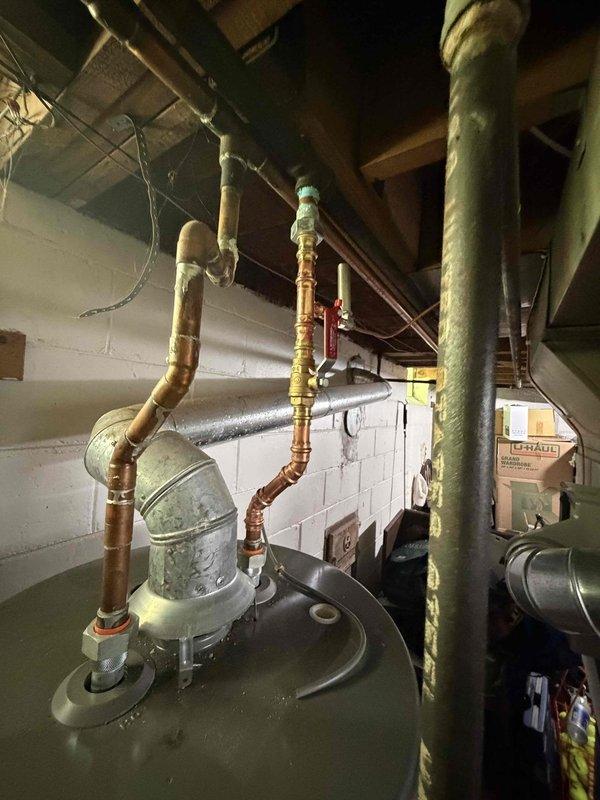 Responded to service call for non-operational Bryant humidifier system located in basement. Upon inspection, diagnosed failed water supply motor preventing proper water distribution to humidifier pad. Motor showed no electrical continuity and was unable to pump water through supply line to humidification assembly. Replaced defective water supply motor with OEM equivalent component, reconnected water supply tubing and electrical connections, and verified proper operation of humidifier system integrated with existing HVAC ductwork.