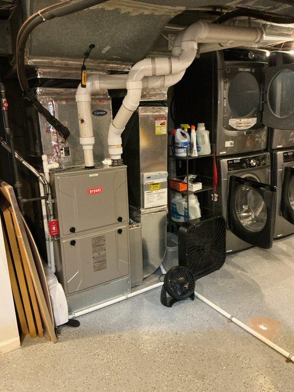 Completed seasonal AC startup and Gold inspection on 10+ year old system with Bryant furnace and Carrier air handler located in basement. Performed comprehensive inspection of indoor and outdoor units, verified system operation after winter storage, checked refrigerant levels, tested electrical components, and ensured proper airflow. Advised property owner to maintain clear area around outdoor condenser unit free of debris and animal waste for optimal performance and efficiency.