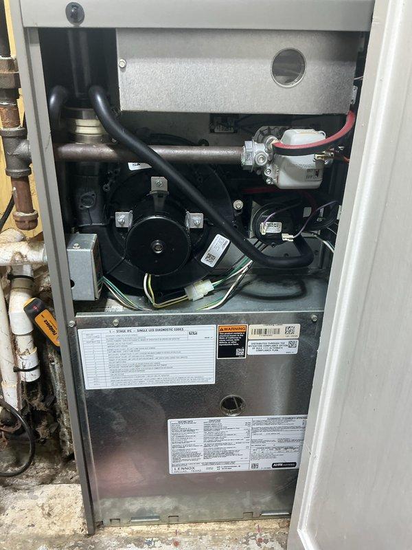 Completed comprehensive tune-up and inspection on 8-year-old furnace and air conditioning system. Inspected furnace interior components including blower motor assembly, gas valve, electrical connections, and heat exchanger; verified proper operation of all safety controls and burner assembly. Performed outdoor condenser unit inspection on Lennox air conditioning system, checking refrigerant levels, electrical connections, and fan motor operation. All equipment found operating within manufacturer specifications with no immediate repairs required.