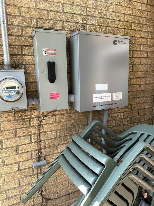 Completed preventive maintenance on Cummins standby generator unit at residential location. Performed comprehensive tune-up inspection including visual examination of electrical connections, disconnect box, and meter assembly. Verified proper operation of generator control panel and power generation system. Inspected mounting pad, ventilation grilles, and exterior housing for proper condition. All components found operational and system confirmed in working order upon completion of scheduled maintenance service.