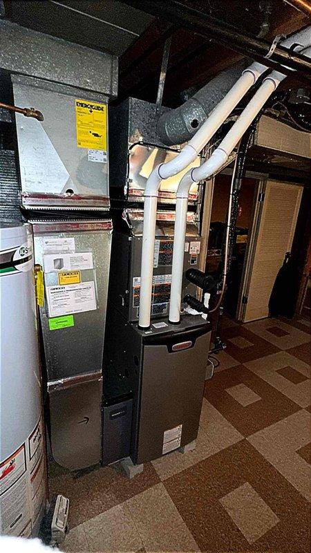 Completed installation of 2-ton air conditioning system with matching evaporator coil in rear utility room location. Installed new air handler unit with proper condensate drainage lines, connected all electrical components, and integrated ductwork with reflective insulation. All mechanical, electrical, and air conditioning permits were secured prior to installation, and system was tested for proper operation upon completion.