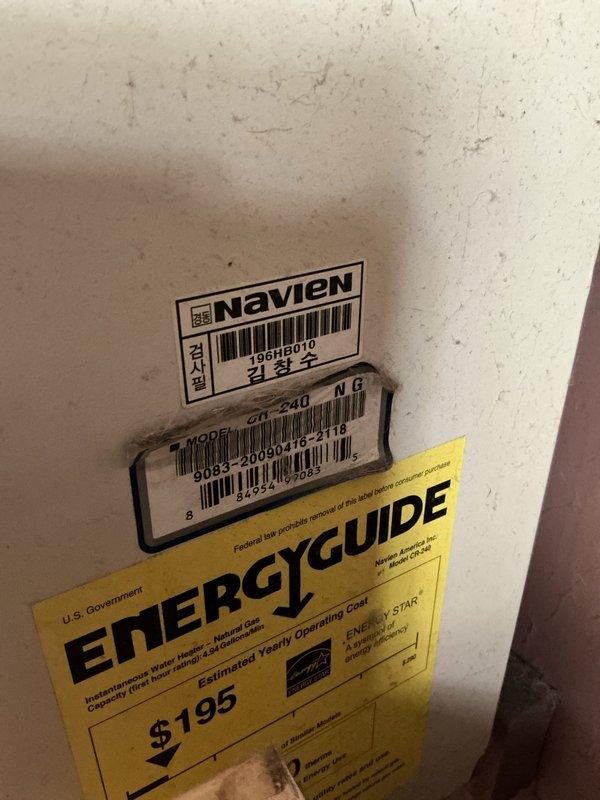 Responded to no hot water condition at residential property with Navien 240NG tankless water heater displaying error code. Upon arrival, unit was non-operational in laundry room location. Performed diagnostic assessment of internal components including heat exchanger, blower motor assembly, and control board circuits. Identified disconnected or loose electrical connections preventing proper unit operation. Reconnected wiring harness to circuit board and verified all electrical connections were secure throughout the system. Tested blower motor function and confirmed heat exchanger integrity. Cycled unit through complete startup sequence, cleared error codes from control panel, and restored hot water service to all fixtures throughout the home. Unit returned to normal operating parameters with proper ignition, flame detection, and temperature modulation confirmed.