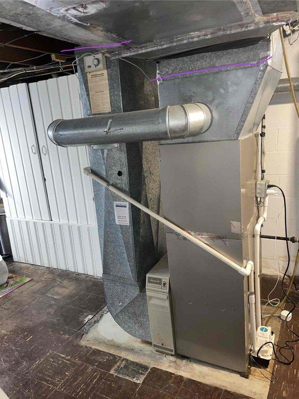 Conducted comprehensive on-site evaluation for complete HVAC system replacement in residential basement installation. Assessed existing furnace, indoor evaporator coil, and outdoor condensing unit for replacement recommendations. Documented current equipment configuration including ductwork connections, plenum assembly, and existing infrastructure to provide accurate full system replacement quote encompassing new furnace, indoor coil, and outdoor condenser unit.