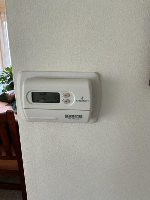 Provided estimate for complete air conditioning system replacement including outdoor condensing unit and indoor evaporator coil located in basement. Existing 10+ year old unit had failed the previous year with repair costs approaching replacement value and was currently non-operational. System assessment included evaluation of natural gas furnace compatibility, existing PVC condensate drainage configuration, and thermostat replacement requirements to ensure proper integration with new equipment.