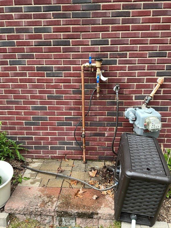 Completed annual sprinkler backflow testing and water treatment maintenance for municipal compliance certification. Performed comprehensive inspection and testing of backflow prevention device, verified proper operation of all valves and connections, and documented results with photographic evidence of gas meter assembly and exterior plumbing components. All systems tested within acceptable parameters and certification documentation prepared for submission to municipal authorities.