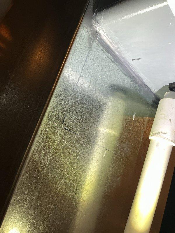 Responded to mechanical violation notice by addressing two warranty issues on recently installed HVAC system. Resealed the bottom of the humidifier unit to eliminate potential moisture intrusion points. Resolved condensate leak occurring inside the furnace cabinet by inspecting drain pan integrity, verifying proper drainage flow through PVC condensate lines, and ensuring all connections were secure and properly sealed to prevent future water accumulation.