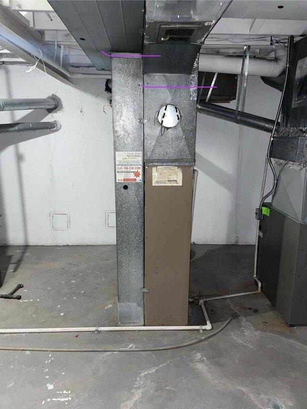 Conducted on-site assessment of non-operational furnace system in basement mechanical room, unit age 20+ years. Evaluated existing beige air handler with associated ductwork, PVC condensate drainage system, and metal supply/return duct configuration. Provided comprehensive replacement estimate for new furnace system to restore heating functionality to the property.