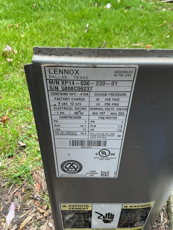 Completed comprehensive tune-up and inspection on 18-year-old Lennox XP14-036-230-01 air conditioning unit and gas furnace system. Inspected outdoor condenser unit containing HFC-410A refrigerant, verified manufacturer specifications and electrical ratings at 208/230V, and documented unit condition. Performed internal inspection of gas furnace assembly, examined burner operation with protective seals, checked gas valve assembly with connections, and assessed heat exchanger components for proper function and safety compliance.
