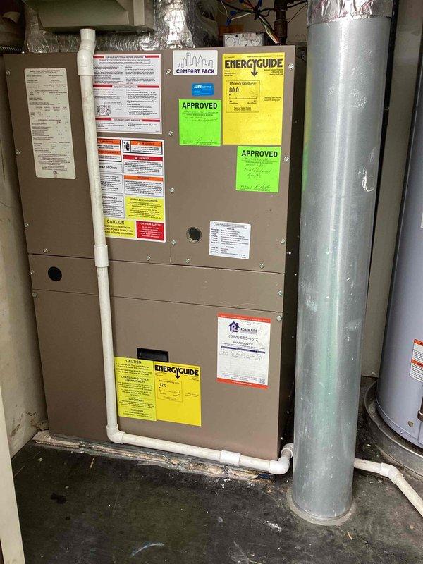Completed estimate for full HVAC system replacement due to leaking evaporator coil on existing 2021 installation. Assessed current air handler unit and condensing unit configuration in basement utility room, documented equipment specifications and existing ductwork connections including galvanized supply plenum and PVC condensate drainage system. Provided comprehensive replacement options for complete heating and cooling system to address failed coil component.