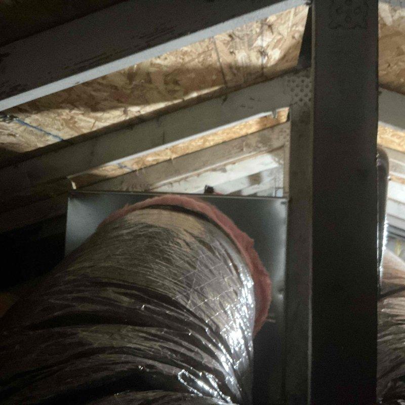 Completed a comprehensive air handler installation over a two-day period in an attic space. Installed new air handler unit with associated components including drain pan, wet switch, S40 thermostat, condensate pump, and new registers throughout the residence. Routed flexible ductwork through attic structure and connected to new air handler system. Coordinated with electrical contractor for 200-amp panel upgrade to support new HVAC equipment. Requested and obtained mechanical and electrical permits for installation work. System was tested and verified operational upon completion, with utility rebate applications submitted for energy-efficient equipment.