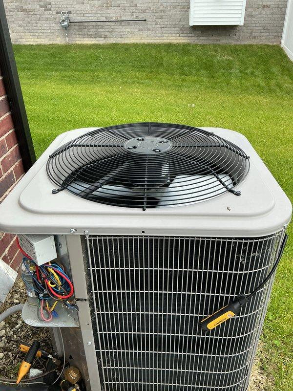 Completed prepaid maintenance inspection on 3-year-old residential air conditioning system. Performed comprehensive evaluation of outdoor condenser unit, including visual inspection of refrigerant service valves, copper line sets with insulation, electrical connections, and condenser coil condition. Unit found operating within normal parameters with all components properly secured and functioning. Documented equipment condition with photographic records for maintenance history.