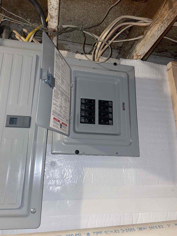 Completed comprehensive estimate for replacement of aging HVAC system and water heater, with water heater exhibiting black substance discharge indicating potential sediment buildup or tank deterioration. Documented existing electrical infrastructure in attic space, including breaker panel configuration and gas piping assembly, to assess compatibility requirements for new equipment installation.