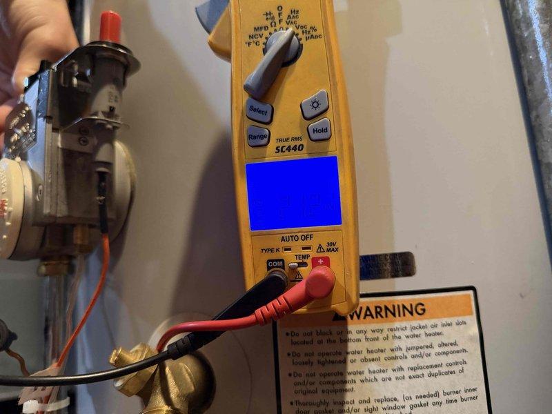 Responded to service call for 12-year-old tanked water heater with extinguished pilot light. Upon arrival, performed diagnostic testing of the gas valve assembly using digital multimeter to verify electrical continuity and proper voltage readings. Testing revealed the gas valve was not functioning within manufacturer specifications, indicating component failure rather than a simple pilot relight situation. 

Given the age of the unit and the failed gas valve component, recommended full water heater replacement rather than repair, as the cost of replacing the gas valve assembly on a 12-year-old unit would not be cost-effective given the typical 8-10 year service life of residential water heaters. Explained to homeowner that additional components are likely near end of service life and that investing in repairs at this stage would provide limited return. Homeowner was previously aware that replacement might be recommended based on unit age and condition.

Documented equipment condition w