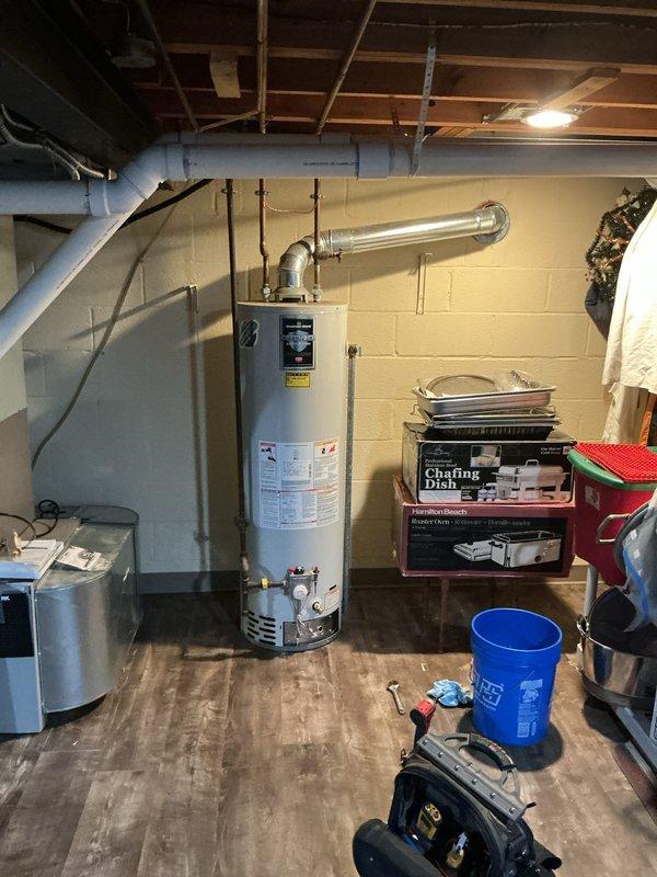 Responded to service call for 12-year-old tanked water heater with extinguished pilot light. Upon arrival, performed diagnostic testing of the gas valve assembly using digital multimeter to verify electrical continuity and proper voltage readings. Testing revealed the gas valve was not functioning within manufacturer specifications, indicating component failure rather than a simple pilot relight situation. 

Given the age of the unit and the failed gas valve component, recommended full water heater replacement rather than repair, as the cost of replacing the gas valve assembly on a 12-year-old unit would not be cost-effective given the typical 8-10 year service life of residential water heaters. Explained to homeowner that additional components are likely near end of service life and that investing in repairs at this stage would provide limited return. Homeowner was previously aware that replacement might be recommended based on unit age and condition.

Documented equipment condition w