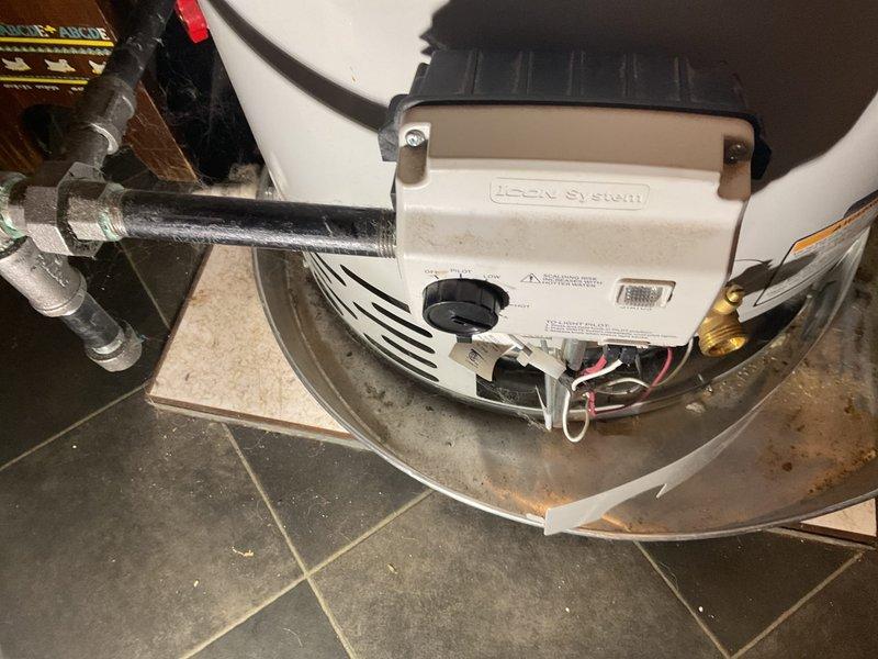 Responded to no hot water complaint on 5-year-old residential water heater under Flame 10/10 warranty. Upon inspection, diagnosed failed gas control valve assembly preventing burner ignition. Replaced defective gas control valve with manufacturer-approved warranty replacement part, verified proper pilot light ignition and main burner operation, tested temperature and pressure relief valve functionality, and confirmed hot water delivery to fixtures. System restored to full operational status with all safety controls functioning within specifications.