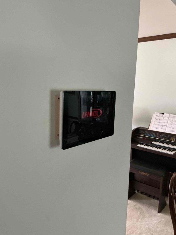 Completed new air conditioning system start-up and commissioning. Addressed customer concerns regarding cosmetic marks on metal ductwork and evaluated thermostat placement, documenting current installation with photos for potential future adjustments. System operational and functioning within manufacturer specifications.