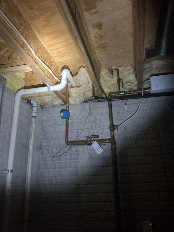 Conducted on-site evaluation of existing plumbing infrastructure in basement utility area to provide estimate for backflow preventer installation as required by City of Birmingham code compliance. Assessed current water supply piping configuration, including copper and PVC lines, to determine optimal placement and connection points for backflow prevention device that meets municipal specifications.