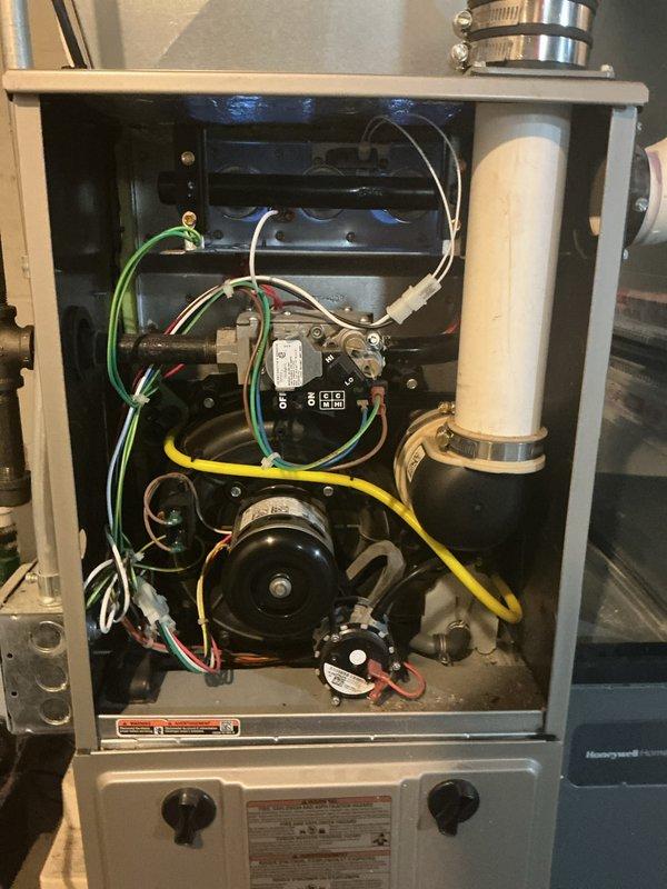 # HVAC Maintenance - Gold AC Inspection

Completed comprehensive Gold-level air conditioning inspection on approximately one-year-old Bennett brand system with condensing unit located outdoors and air handler in basement. Performed thorough visual examination of both indoor and outdoor components, including electrical connections, blower motor assembly, control modules, refrigerant lines, condenser fan operation, and all wiring harnesses. Verified proper installation of condensing unit on pad, inspected fan guard and grille security, and assessed overall system condition. All components found to be in good working order with normal wear patterns consistent with age and outdoor exposure. System operating within manufacturer specifications with no immediate service needs identified.