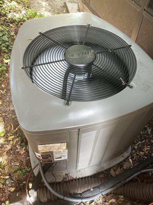 # HVAC Maintenance - Gold AC Inspection

Completed comprehensive Gold-level air conditioning inspection on approximately one-year-old Bennett brand system with condensing unit located outdoors and air handler in basement. Performed thorough visual examination of both indoor and outdoor components, including electrical connections, blower motor assembly, control modules, refrigerant lines, condenser fan operation, and all wiring harnesses. Verified proper installation of condensing unit on pad, inspected fan guard and grille security, and assessed overall system condition. All components found to be in good working order with normal wear patterns consistent with age and outdoor exposure. System operating within manufacturer specifications with no immediate service needs identified.