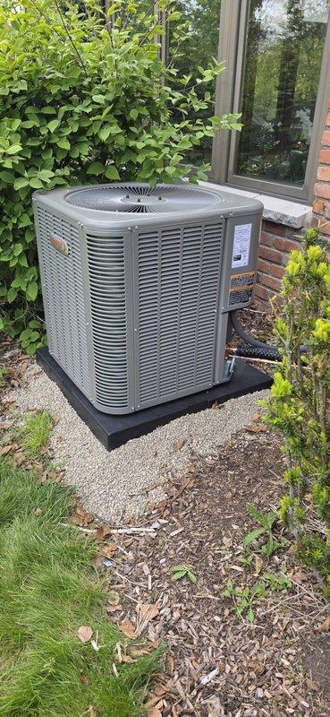Completed full Unico system replacement including 4-ton air conditioning condenser unit and left-side air handler installation. Performed refrigerant line flush, installed new drain pan with wet switch safety device, ran four new ductwork branches, and installed condensate pump. Unit reconnected and positioned on composite pad with proper clearances, mechanical and electrical permits obtained for complete system commissioning.