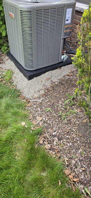 Completed full Unico system replacement including 4-ton air conditioning condenser unit and left-side air handler installation. Performed refrigerant line flush, installed new drain pan with wet switch safety device, ran four new ductwork branches, and installed condensate pump. Unit reconnected and positioned on composite pad with proper clearances, mechanical and electrical permits obtained for complete system commissioning.