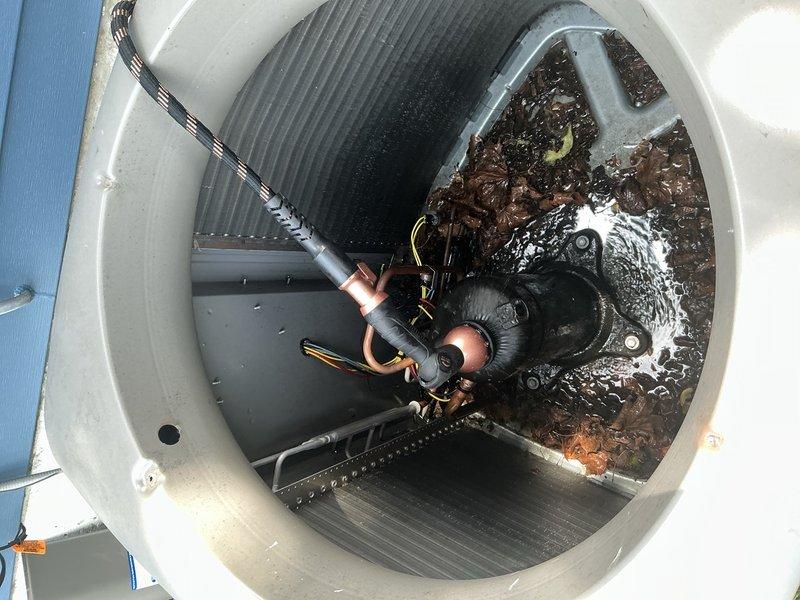 Responded to service call for AC system not cooling effectively throughout home. Upon arrival, performed diagnostic inspection of outdoor condensing unit. Accessed electrical compartment and inspected capacitor, contactor, and wiring connections for proper operation. Verified system components and electrical connections were secure. Completed visual inspection of condenser coil and mechanical components. System evaluated and findings documented with photographic evidence for customer records.