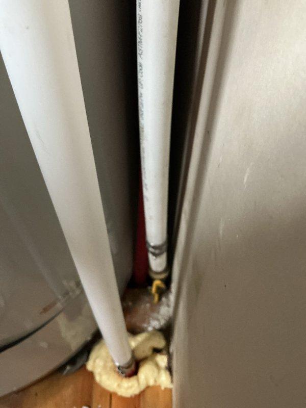 Completed installation of a 40-gallon Bradford White tanked water heater with full reconnection of copper supply lines and brass fittings, including proper venting through metallic flue pipe. Additionally performed miscellaneous plumbing tasks including toilet removal and valve replacement to support the overall mechanical system upgrade.