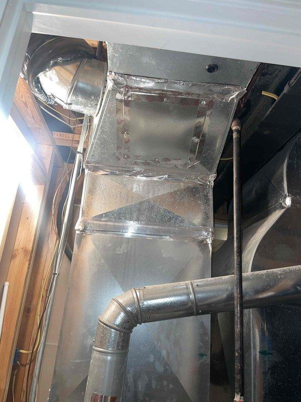 Conducted full system estimate for replacement of aging air conditioning unit and furnace. Performed comprehensive evaluation of existing HVAC equipment located in basement, including assessment of current air handler, ductwork configuration, and system accessibility. Documented equipment conditions through detailed photography, noting standard wear on metal ductwork components, existing filter housing setup, and proximity to water heater for clearance considerations. Evaluated attic-space ductwork including flexible and rigid metal elbows, main plenum assembly, and structural mounting points to determine compatibility with new system installation. Provided customer with complete replacement options for both cooling and heating equipment based on current system layout and infrastructure requirements.
