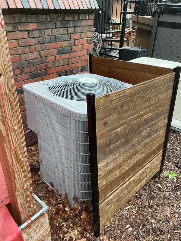 Completed comprehensive Gold AC inspection on residential property with two mini-split systems: a 1-2 year old unit serving the three-season room and a 3-4 year old unit located in the attic. Performed thorough visual inspection of outdoor Carrier condensing unit, verified proper operation of fan assembly, examined refrigerant line connections, and confirmed unit stability on concrete pad. Inspected condenser coil fins for debris accumulation and airflow restrictions, checked electrical connections at outdoor unit, and documented equipment condition through photographic documentation. Both systems were evaluated for proper operation within manufacturer specifications, with weather conditions suitable for accurate performance assessment.