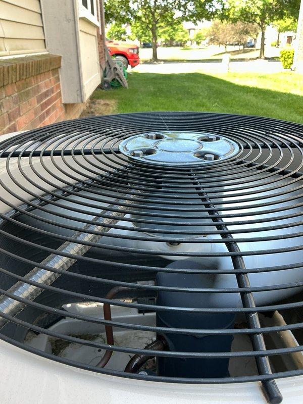 Completed comprehensive AC inspection on 2020 system with coil located in basement. Performed thorough examination of outdoor condenser unit, including protective grille, heat exchanger coils, and fan assembly, verifying proper operation and condition. Inspection also included evaluation of humidifier, thermostat, and hot water tank to ensure all components are functioning within normal parameters.