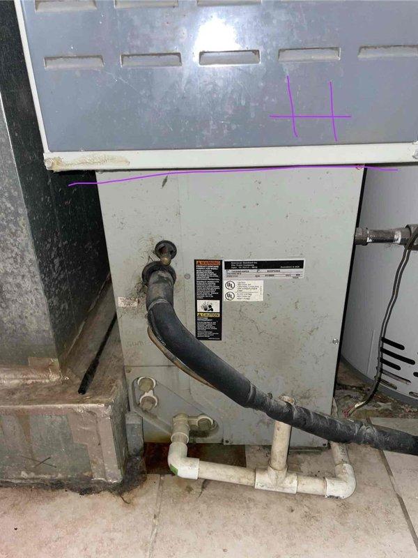 Completed comprehensive estimate for replacement of aging central air conditioning system utilizing obsolete R22 refrigerant. Existing evaporator coil exhibited freezing conditions, and system demonstrated inadequate cooling performance with thermostat set to 69°F while interior temperature remained at 75°F. Visual inspection revealed significant corrosion around ductwork connections and general wear on HVAC components, confirming need for complete system replacement rather than repair due to age and refrigerant phase-out considerations.